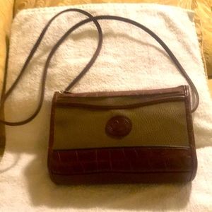 Vintage Dooney and Bourke all weather mass green brown trim. Cross Body